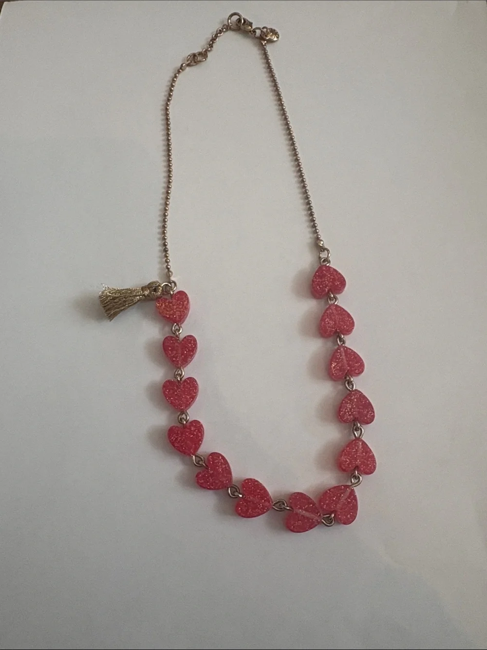 Crewcuts resin heart necklace.